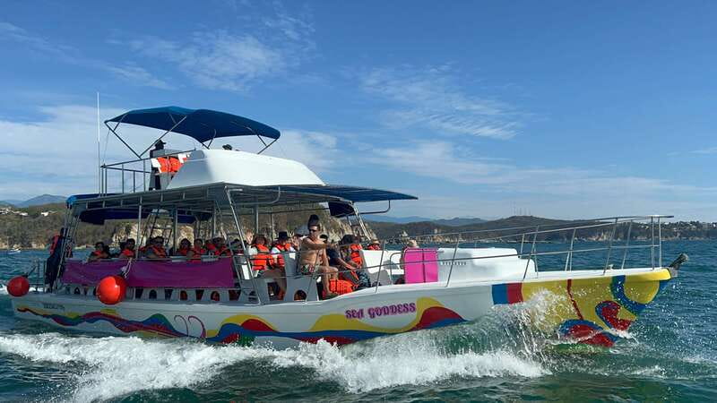 Huatulco: Bays Boat Tour with Snorkeling and Hotel Pickup - Wildlife spotting, the Mixteco Face, and a turtle-shaped island