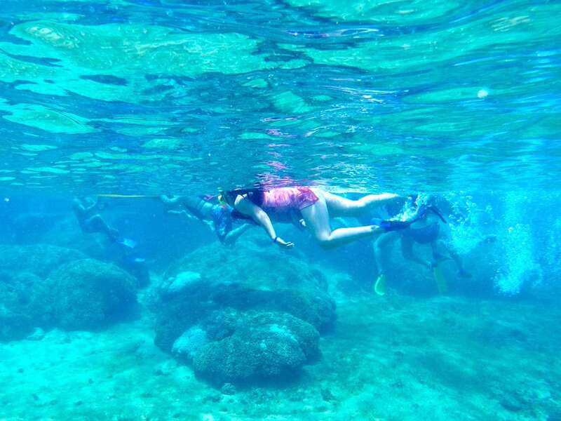Huatulco: Premium Boat Tour with snorkel experience. - The Boat Cruise Between Stops: Rostro Mixteco and a Turtle-Shaped Island