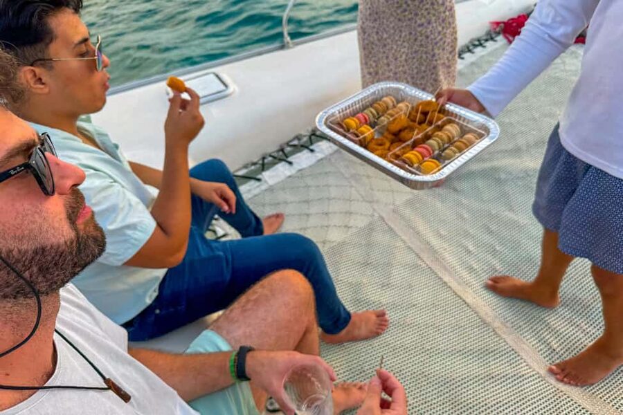 Isla Mujeres: Catamaran Ride with Open Bar, Snorkeling, and Lunch - Playa Norte Beach Club Break, Where the Island Shine Happens