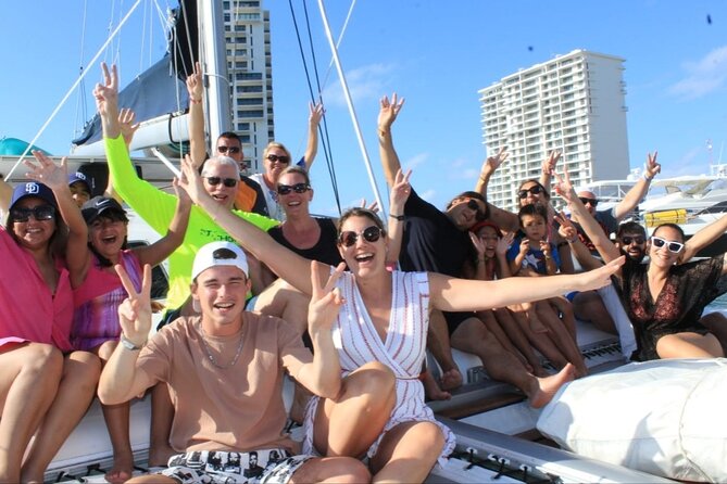 Isla Mujeres Catamaran Tour from Cancun with Snorkel and Open Bar - Getting there: pickup, meeting point, and the Isla Mujeres crossover rule