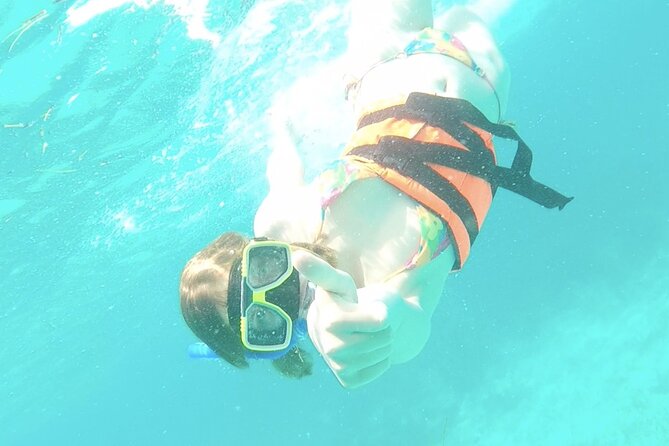 Isla Mujeres Catamaran Tour from Cancun with Snorkel and Open Bar - Snorkeling session: what you get and who should take it slow
