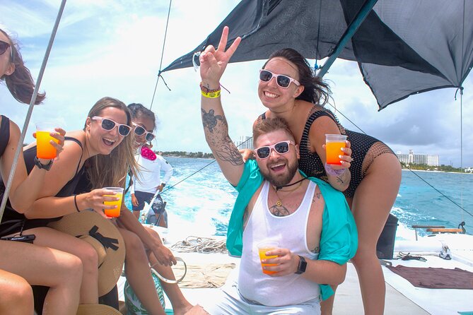 Isla Mujeres Catamaran Tour from Cancun with Snorkel and Open Bar - Isla Mujeres for 1.5 hours: photos, shopping, and getting strategic