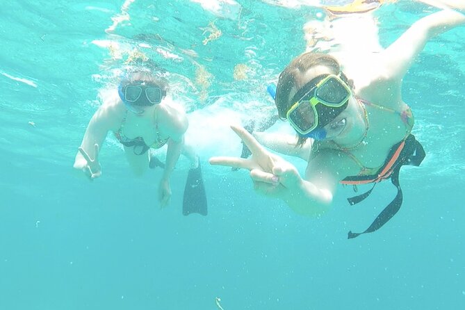 Isla Mujeres Catamaran Tour from Cancun with Snorkel and Open Bar - Beach club buffet lunch: ocean views and real downtime