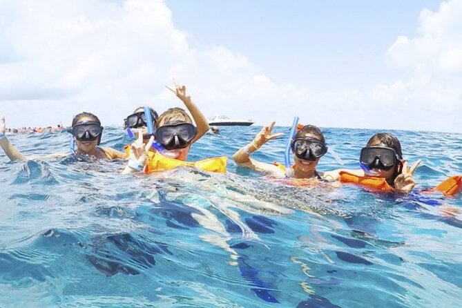 Isla Mujeres Catamaran Tour with Snorkel, Open bar and Transport - El Meco snorkeling: guided reef time, plus the gear reality