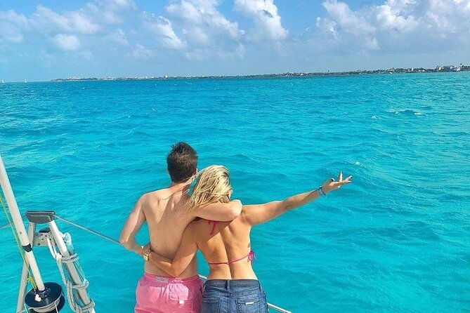 Isla Mujeres Catamaran Tour with Snorkel, Open bar and Transport - Price and value: $85 makes sense, once you account for extras