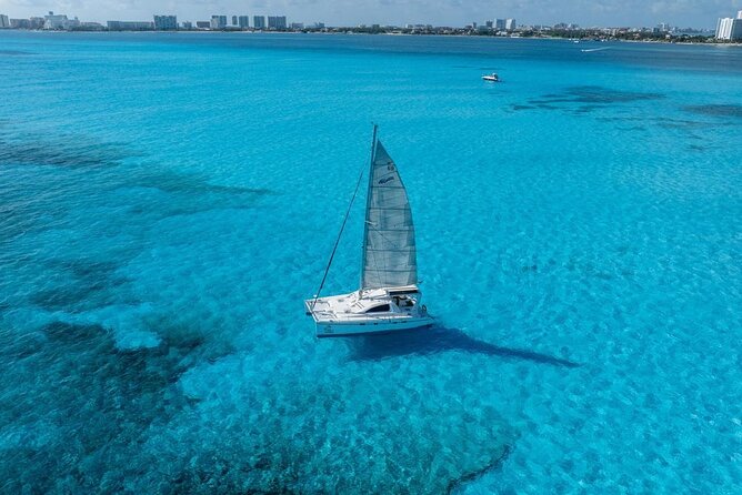 Isla Mujeres Day Tour with Catamaran, Snorkeling & Beach Club - Where You Start: Marina Las Perlas Meeting Point, No Guesswork