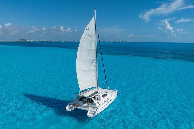 Isla Mujeres Day Tour with Catamaran, Snorkeling & Beach Club - Snorkeling at Bahia Mujeres: Included, Weather-Dependent, and Mostly Focused on Safety