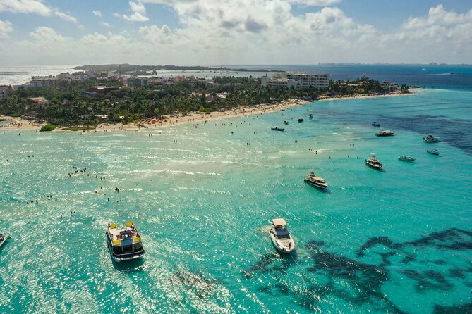 Isla Mujeres Island and Snorkeling Tour - Punta Sam morning: breakfast, check-in, and getting geared up