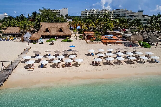 Isla Mujeres luxury catamaran with premium open bar and lunch - Snorkeling and swim time, with weather reality