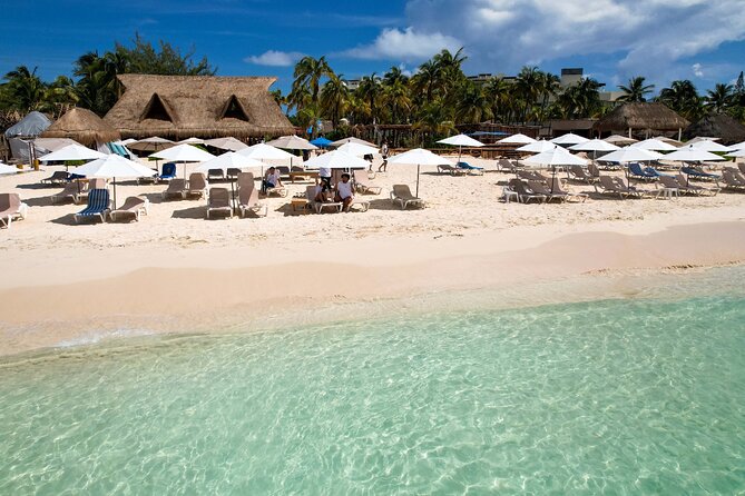 Isla Mujeres luxury catamaran with premium open bar and lunch - Comfort on board: towels, shade, and sunscreen