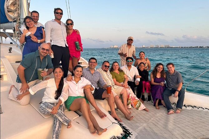 Isla Mujeres Premium Catamaran Tour with transportation from Playa del Carmen - The catamaran experience: crew energy and the open bar