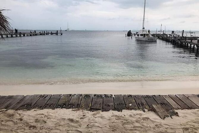 Isla Mujeres Premium Tour in Private Catamaran with Lunch - Isla Mujeres sunset return, plus spinnaker if wind cooperates