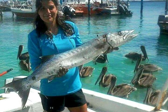 Local Fishing Plus Snorkeling Tour in Isla Mujeres - A half-day fish-and-snorkel rhythm that actually feels doable