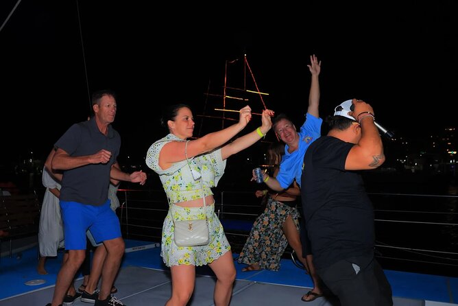 Los Cabos Catamaran Cruise with Open Bar & Light Snack - Onboard vibe: crew energy, music, smoking, and who should skip this