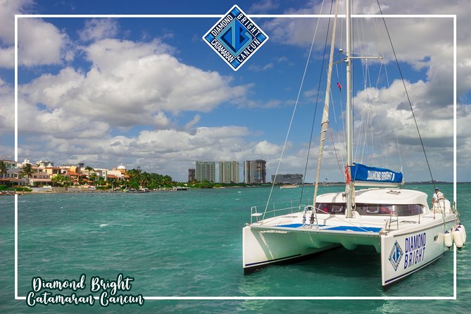 Luxury Catamaran tour to isla mujeres with transportation from Tulum - Isla Mujeres Stop 1: Beach Club Time Plus Downtown Wander