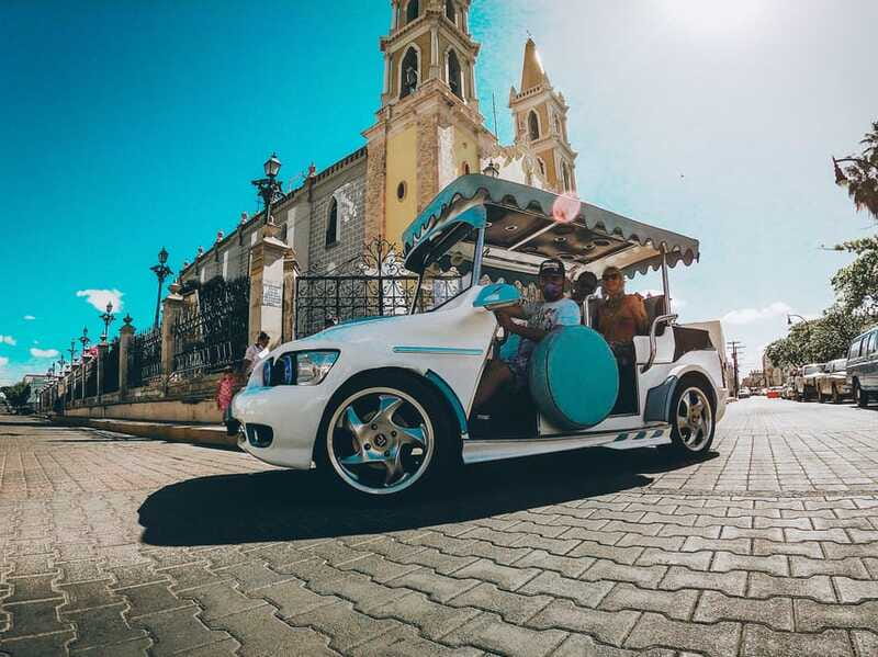 Mazatlan: City Tour in a Traditional "Pulmonia" Open-Air Car - Playa Norte bird feeding: the hands-on stop that changes with the day