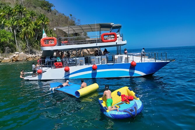 Mega Catamarans ALL INCLUSIVE Remote Paradise Beach Adventure - The return cruise to Puerto Vallarta: music, drinks, and marine life