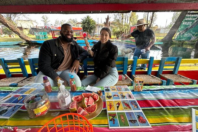 Mexico City Boat Tour Food and Unlimited Drinks Priority Boarding - Cruise time: canal views plus games, music, and free-flowing drinks