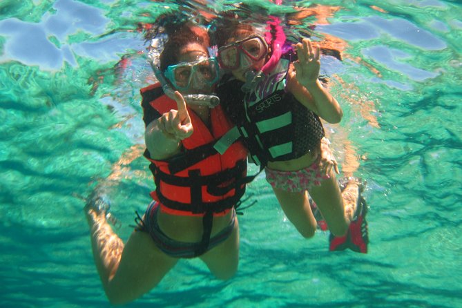 Official Chankanaab Beach Park Day pass with Snorkel - Your beach time at Chankanaab: palapas, hammocks, showers, and the stuff that keeps the day fun