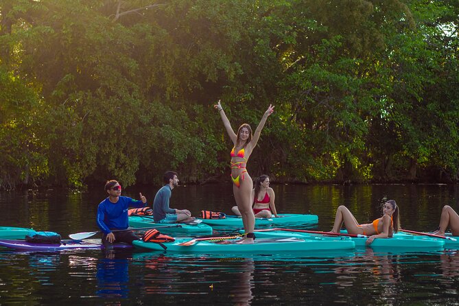 Paddleboarding and/or kayaking tour at sunrise in the lagoon of Bacalar - Sunrise reflections you can actually feel