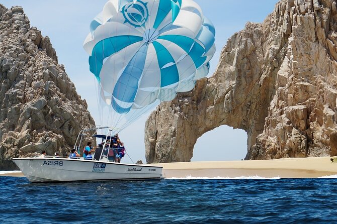 Parasailing Los Cabos Adventure - Two Stops, Arch Overhead and Cabo San Lucas Beach Below