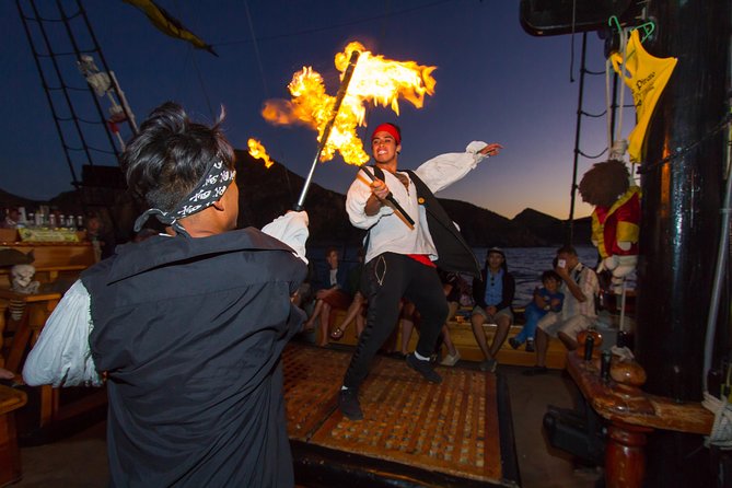 Pirate Ship Sunset Dinner and Show in Los Cabos - The Buccaneer Queen return show: fire, aerobics, and the dance-party push