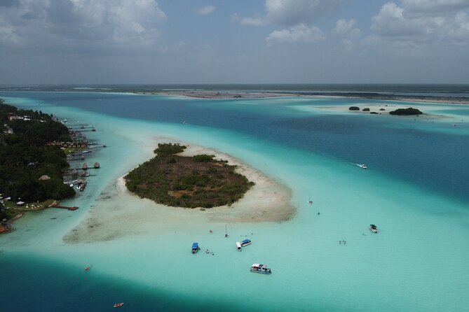 Pontoon Tour - Visit the Pirate Channel, Cenotes and Islands. - Fruit, waters, and iced beer, the small extras that add real value