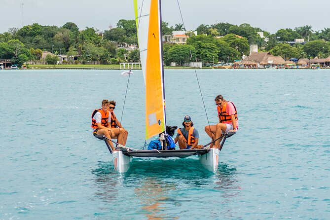 Private Eco-Tour on a Recreational Catamaran with Kayaks Included - On-board comfort: snacks, fruit drinks, beers, and safety gear