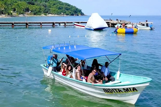 Private Los Arcos Snorkel and Beach Tour from Puerto Vallarta - Las Ánimas beach time: swimming, shade, and lunch at El Corral/Los Conos