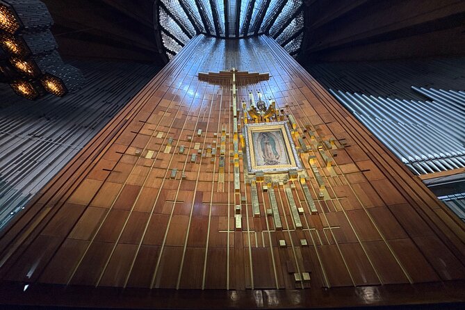 Private Tour in Our Lady of Guadalupe Basilica - Prayer time, candles, and blessing items with meaning