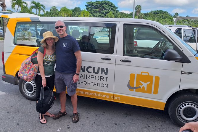 Private Transfer from Cancun Airport to Playa del Carmen - Meeting outside Cancun Airport, the orange suitcase sign system
