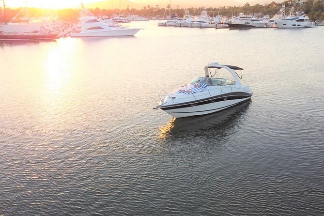 Private yacht charter for cruising & snorkeling in Cabo San Lucas - Food, open bar, and the onboard vibe (Bluetooth included)