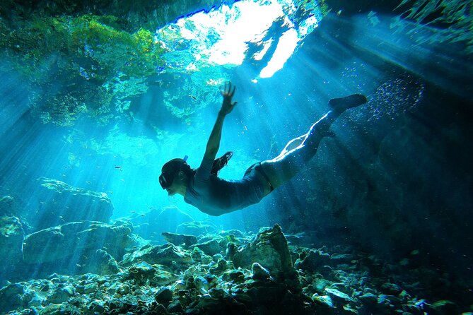 Ride to a life changing cenotes tour - The Second Cenote: Semi-Open Water and Sunlight Patterns