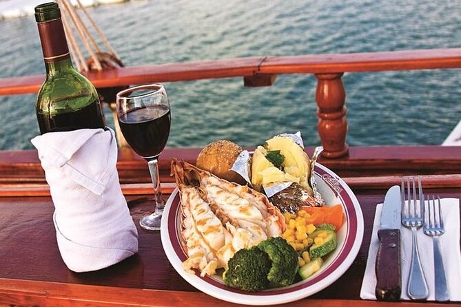 Romantic Sunset Dinner Cruising Experience - Dinner on the deck: lobster, steak, surf and turf, and vegetarian