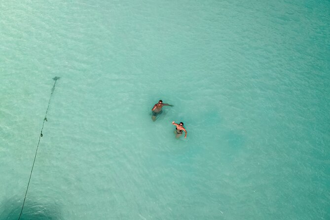 Sailboat tour across the seven colors lagoon in Bacalar - Emerald Cenote: bright water and a proper swim stop