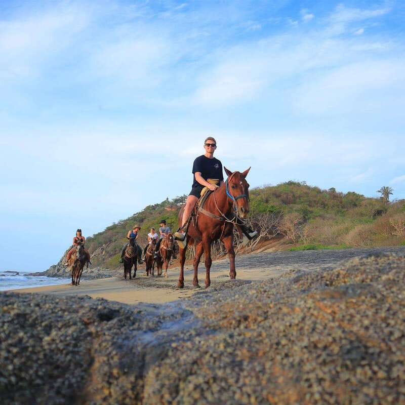 Sayulita: Horseback Riding Tour - Down to the beach: sand, speed options, and real beach riding etiquette