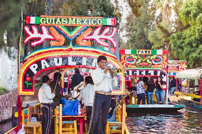 Small Group: Discover Xochimilco, Coyoacán, Frida Kahlo Museum and House - Xochimilco on a trajinera: UNESCO canals, mariachi, and the crowd reality