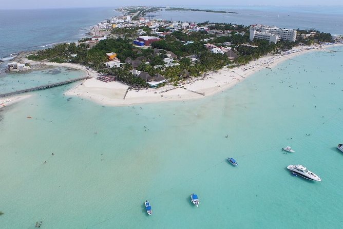 Snorkeling Adventure at Isla Mujeres Includes Lunch and Open Bar - Classic vs Platinum boats: passenger counts, beach club access, and drink quality