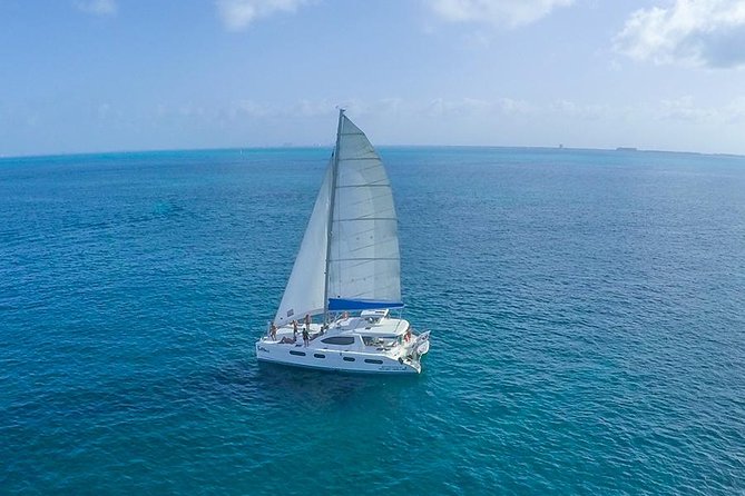 Snorkeling Adventure at Isla Mujeres Includes Lunch and Open Bar - Sailing, spinnaker, and timing: what can change the plan