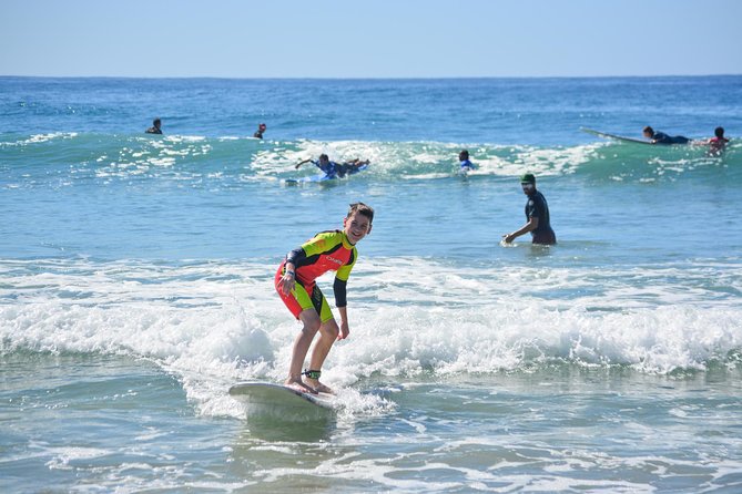 Surf Lessons at Cerritos - Foam boards, rash guards, and the coaching style that gets you standing