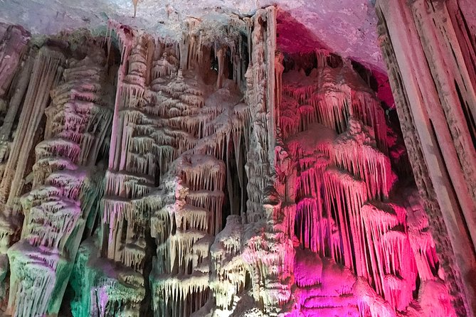 The Grutas de Garcia & Town (Cablecar Ticket + Premium SUV) - Entering Grutas de Garcia: stalactites, stalagmites, and guided pacing