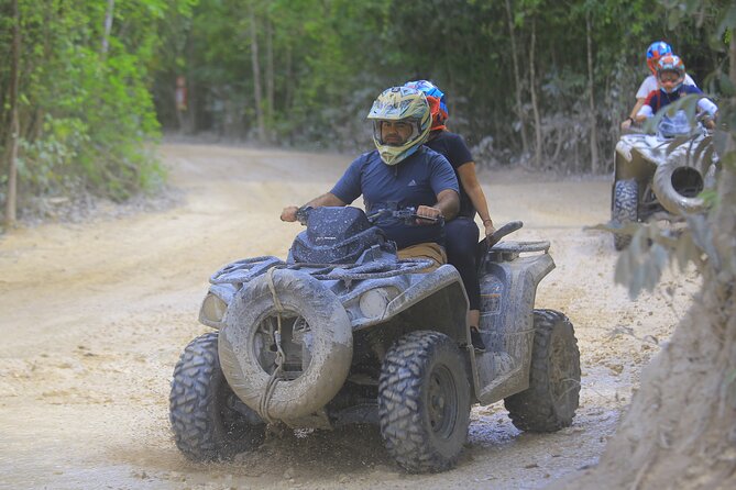 Top ATV's in Mexico includes Cenote, Ziplines, snack & transport. - ATV jungle roads: muddy fun, with real riding rules
