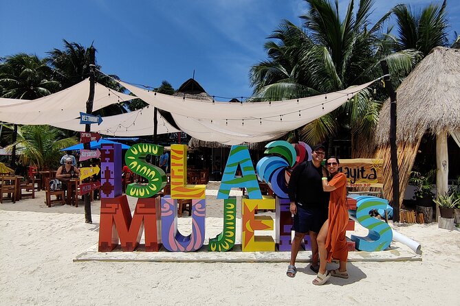 Top Isla Mujeres Catamaran Tour with Snorkel Open Bar and Buffet lunch - Boat size, shade, and comfort: bring the right expectations