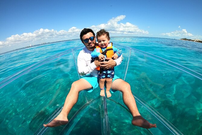 Tour Isla Mujeres excursion in Collective Transparent Boat - Your 45 Minute Route: Marina Bartolomé to Three Reef Stops
