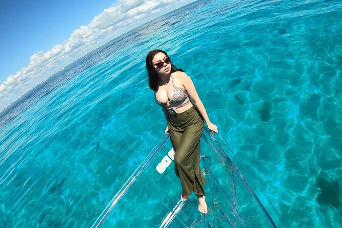 Tour Isla Mujeres excursion in Collective Transparent Boat - Getting On Board: Shoes, Sunscreen, and Comfort Tips