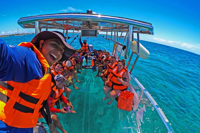 Tour Isla Mujeres excursion in Collective Transparent Boat - Price and Value: What $36.52 Buys You in Real Time