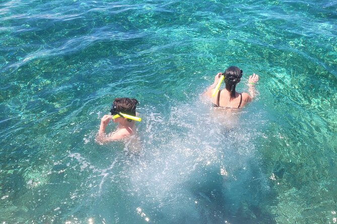 Tour to Cozumel by Catamaran with Snorkeling and Buffet Lunch - Cielito and the Ride to Mía Beach Club, Built for Cooling Off