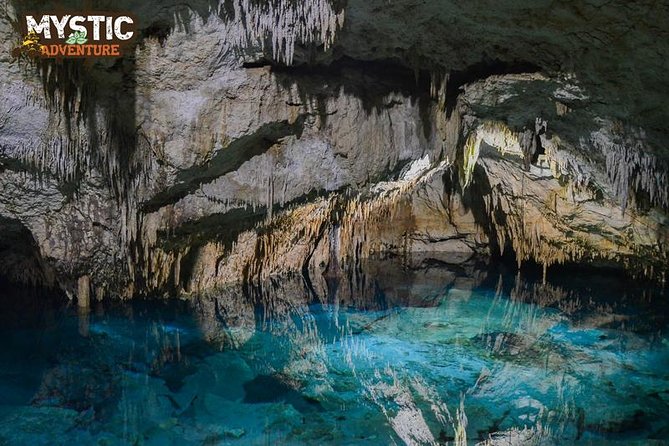 Tulum ruins + Mystic Adventure ATV and Cenotes Experience - Zip-lines plus a cenote tunnel swim: cool water, stalactites, and a guide